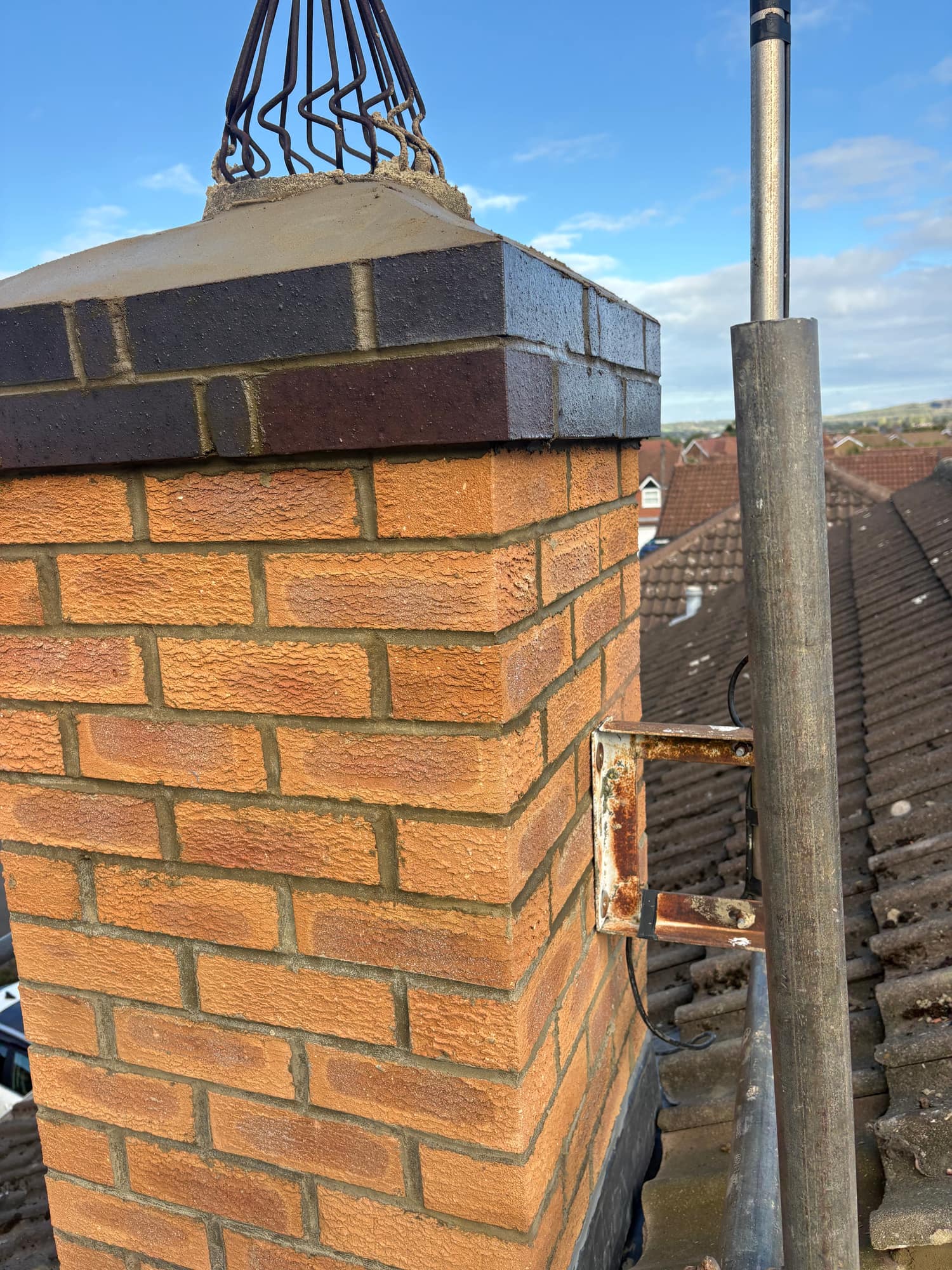 New oversailing course, flaunching and bird guard on a rebuilt chimney stack in Beverley — Armour Shield Roofing Services