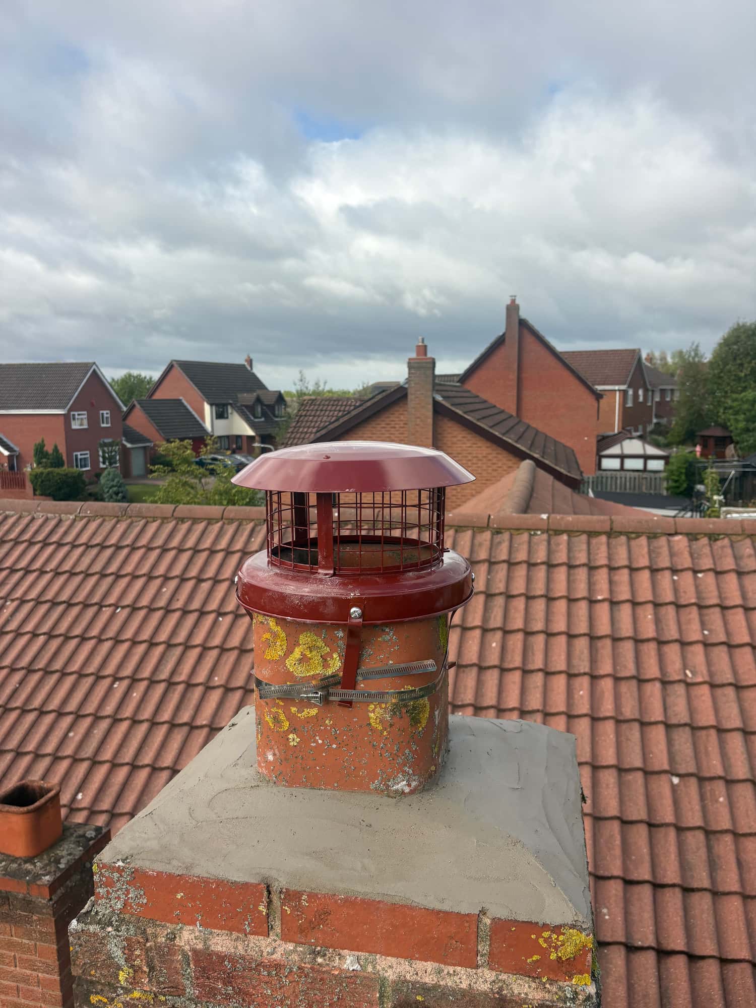 Chimney in Brough with new flaunching and a capping cowl fitted — Armour Shield Roofing Services