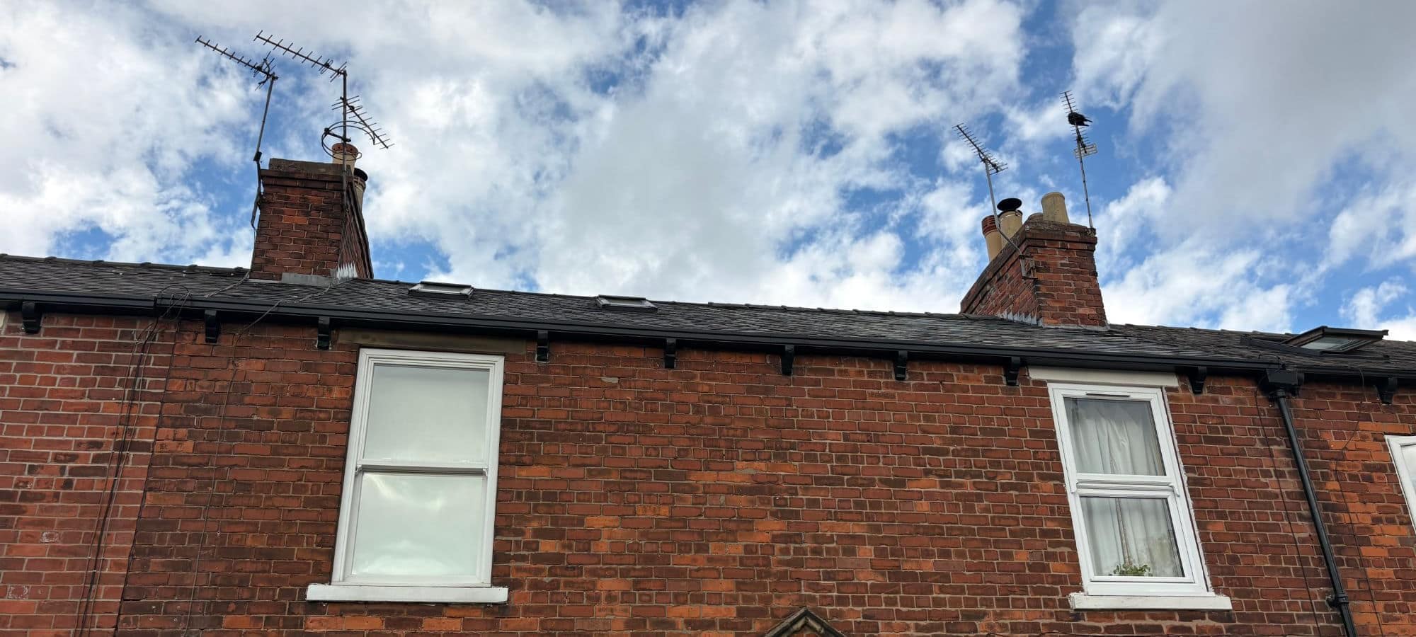Twinplas box gutter fitted across two terraced houses near Queensgate, Beverley